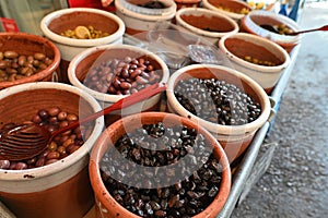 Olives at farmers street market stall in Chania, Greece