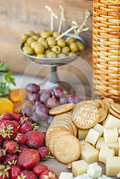 Olives and fruits on a beautifully vintage decorated table