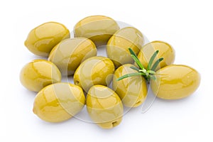 Olives on leaves on white.