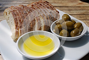 Olives with olive oil and bread