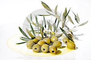 Olives and Olive Oil on plate