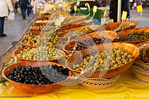 Olives and vegetables for sale at farmers market