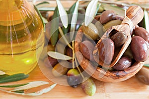 Olives on wooden background, kalamata, kalamon, green olives