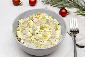 Olivier salad,Christmas food.salad with chicken and vegetables,pea.Traditional ukrainian slavic appetizer for celebrating new year