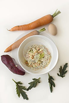 Olivier salad on the table photo