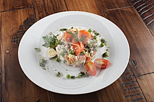 Olivier salad with trout