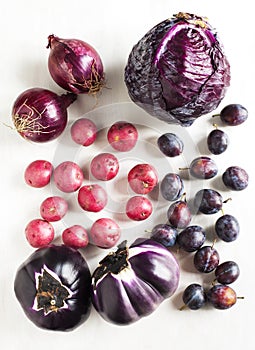 Ð¡ollection of fresh purple toned vegetables.