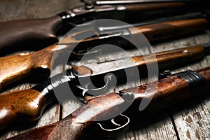 ollection of hunting rifles