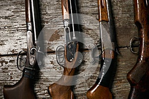 ollection of hunting rifles