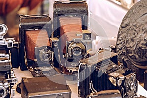 Ð¡ollection of retro photo cameras in the vintage market