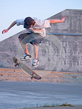 Ollie - Young skater ollieing a skateboard