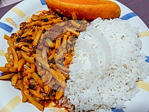Olluco stew with rice and sweet potato, Peruvian homemade food. photo