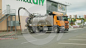 OLOMOUC, CZECH REPUBLIC, JUNE 29, 2020: Sewer cleaning tank truck car pipe drain cleaning shaft septic cesspool pumping