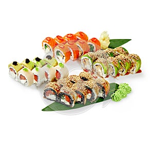 ?olorful assortment of Japanese sushi rolls on bamboo leaves