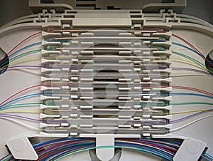 olorful connections: Fiber optic distribution box and its braided wires in various colors