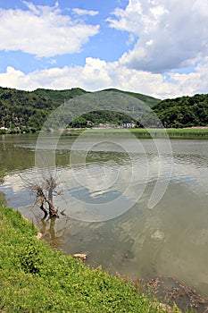 Olt River, Romania - Beautiful landscape with lake and mountains