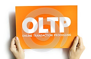 OLTP - Online Transaction Processing acronym on card, abbreviation concept background