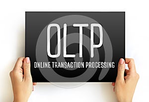 OLTP - Online Transaction Processing acronym text on card, abbreviation concept background