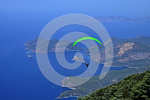 Oludeniz Beach And Blue Lagoon, Oludeniz beach is best beaches in Turkey - Fethiye, Turkey - Paraglider flies in the sky