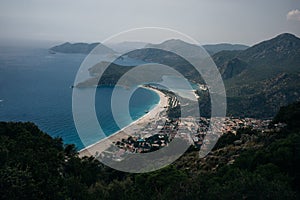 Oludeniz blue lagoon and sand beach in Fethiye, Turkey.