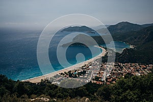 Oludeniz blue lagoon and sand beach in Fethiye, Turkey.