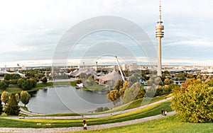 Olympiapark Munchen under the sunlight and a cloudy sky in Munich in Germany