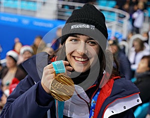 Olympic champion in Ladies` Moguls Perrine Laffont of France posing with gold medal