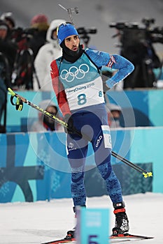 Olympic champion Martin Fourcade of France competes in biathlon men`s 12.5km pursuit at the 2018 Winter Olympics