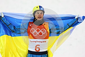 Olympic champion Oleksandr Abramenko of Ukraine celebrates victory in the Men`s Aerials Freestyle Skiing at the 2018 Olympics