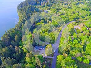 Olympic Penninsula aerial photos of the Puget Sound and land with houses near Olympia, WA