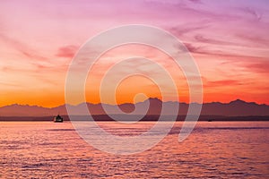 An Olympic Washington Sunset over a Ferry
