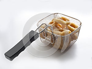 Frying pan basket with roman squid inside photo
