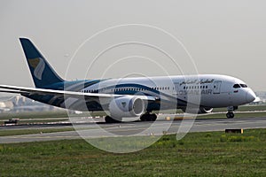 Oman Air taxiing on runway