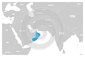 Oman blue marked in political map of South Asia and Middle East. Simple flat vector map