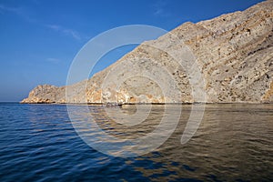 Oman boat sea view, mountain fjords, Khasab