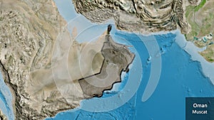 Oman border shape overlay. Bevelled. Satellite. Labels