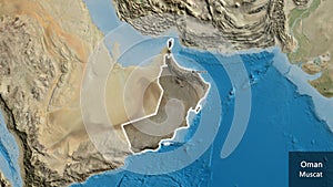 Oman border shape overlay. Glowed. Satellite. Labels