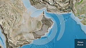 Oman border shape overlay. Outlined. Satellite. Labels