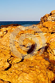 in oman coastline sea ocean gulf rock and beach relax near sky