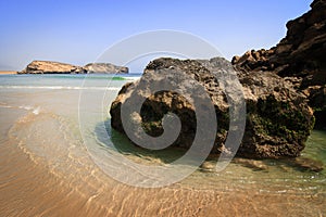 Oman: Deserted beach in Dhofar photo