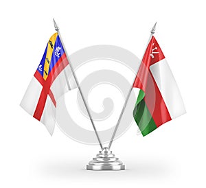 Oman and Herm table flags isolated on white 3D rendering