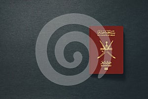 Oman Passport on dark background with copy space - 3D Illustration