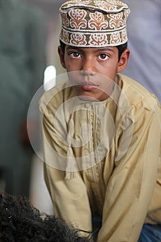 Omani boy with traditional clothing