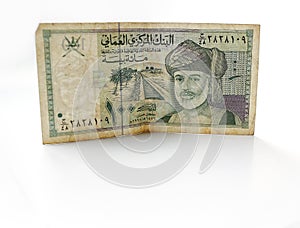 Omani rial or riyal currency on white background