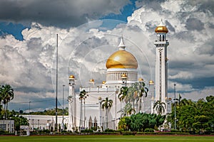 Omar Ali Saifuddien Mosque in Bandar Seri Begawan, Brunei Darussalam at daytime with white clouds and blue sky background