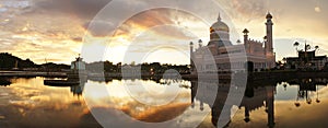 Omar Ali Saifuddien Mosque during sunset with reflection in the calm pond water in Bandar Seri Begawan, Brunei.