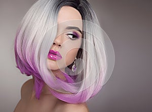 Ombre bob blonde short hairstyle. Purple makeup. Beautiful hair