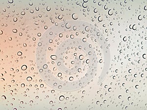 OmbrÃÂ© sunset with raindrops background