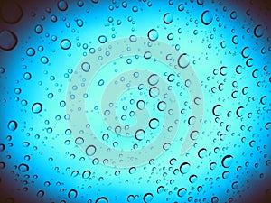 OmbrÃ© blue background with raindrops background