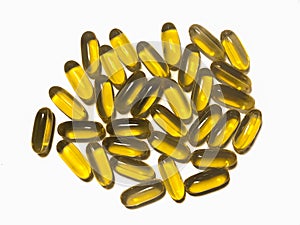 Omega-3 capsules on a white background. Polyunsaturated fatty acids. The concept of a healthy lifestyle